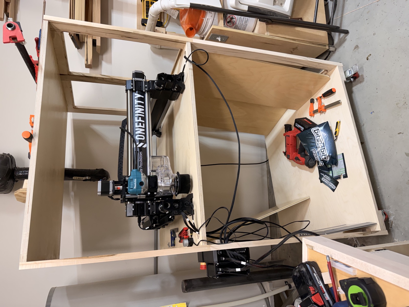 CNC cabinet housing a Onefinity machine in progress