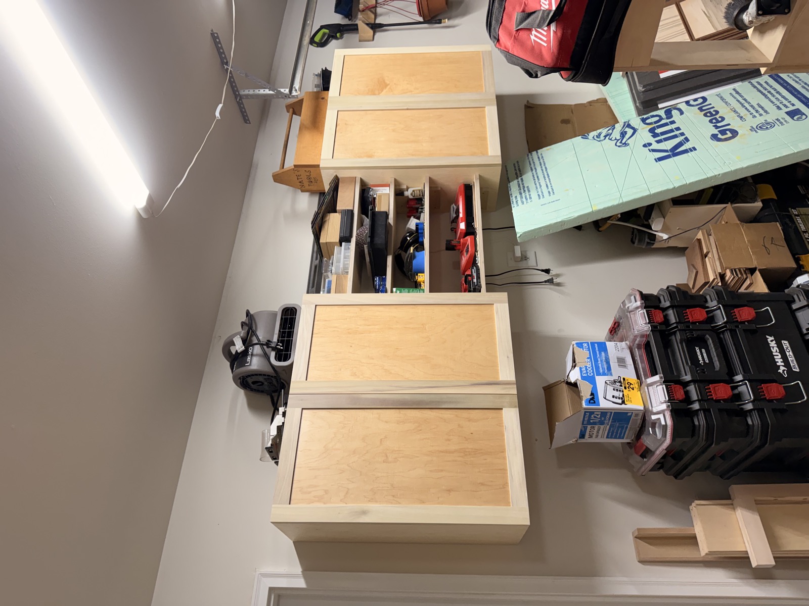 Wall-mounted maple garage cabinets